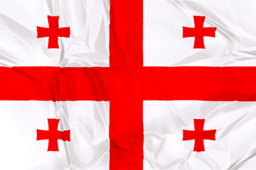 The national Georgia waving flag in 3d background.