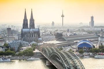 Koln cityscape with cathedral and steel bridge, Germany