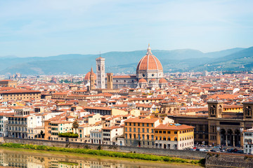 Fototapeta na wymiar Florence aerial cityscape view from Michelangelo square on the old town with famous cathedral church and river in Italy