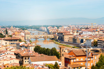 Florence aerial cityscape view from Michelangelo square on the old town and river with bridges in Italy
