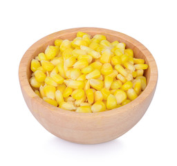 Sweet corn in wooden bowl isolated on white