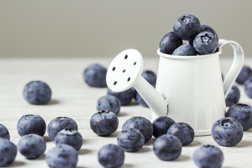 Fresh blueberries on the wooden table