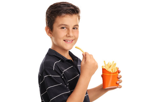 Smiling Boy Eating Fries