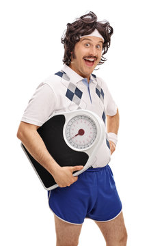 Retro guy posing with a weight scale