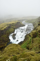 Waterfall of South Iceland. Misty Iceland.