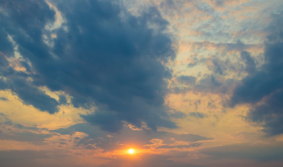 Naklejka na ściany i meble The beautiful stream of cloud on the background of sunset