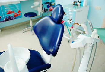 Blue dental chair in a dental office