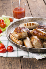 Grilled chicken sausages and burgers.