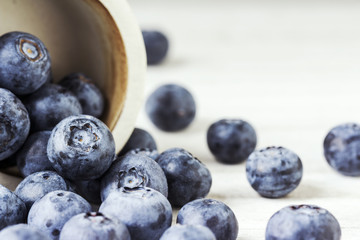 Fresh blueberries on the wooden table