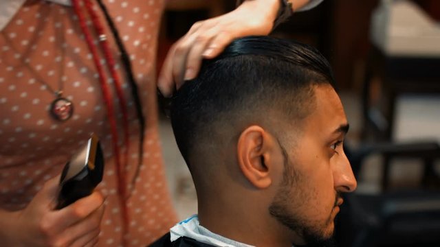 Attractive man at the barbershop