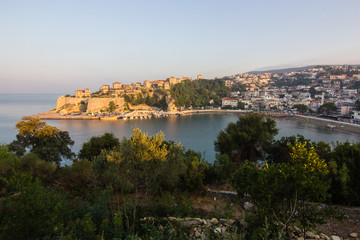 Sunrise landscape of small old town Ulcinj in Montenegro at adriatic sea