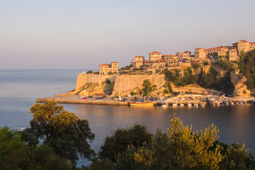 Sunrise landscape of small old town Ulcinj in Montenegro at adriatic sea