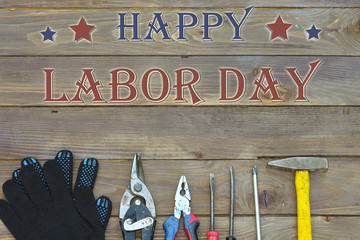 Labor day on the Board with the tools and the flag of the United States. The view from the top. 7...