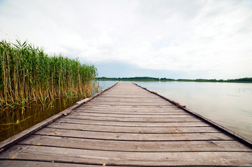 Fototapeta premium wooden pier over lake