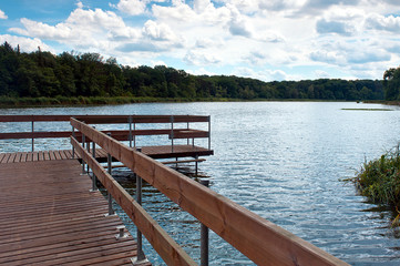 wooden bridge over lake