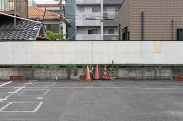 Large blank billboard on a street wall, banners with room to add your own text