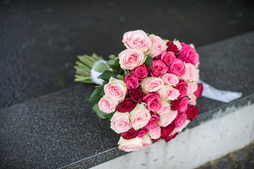 Wedding bouquet. Water and rain on background.