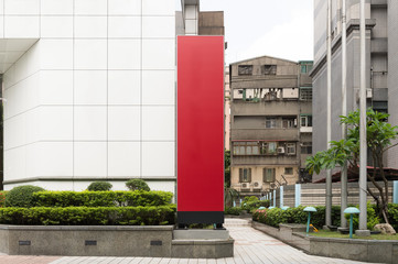 Large blank billboard on a street wall, banners with room to add your own text