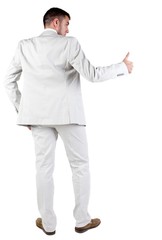 Back view of young business man in white suit going thumb up, isolated on white background. Rear view.Showing of positive emotions with OK sign concept .
