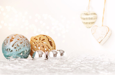 Sparkly christmas decorations on white background