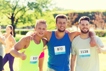 happy friends with racing badge numbers