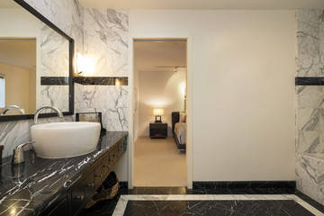 Bathroom with marble and round wash basin