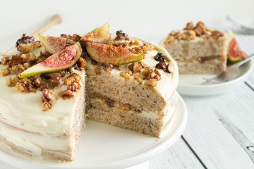 Sliced fig cake on plate. 