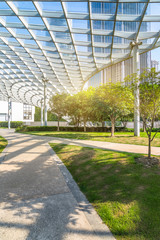 beautiful park and glass canopy at a sunny day