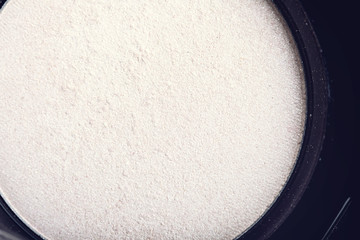 Palette concealer and correctors. Make-up base. Isolated on black background