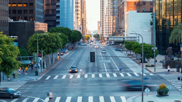Time-lapse of traffic and people at a busy intersection in Downtown Los Angeles
