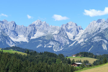 Fototapeta na wymiar Farmhouses and Wilder Kaiser - Tirol