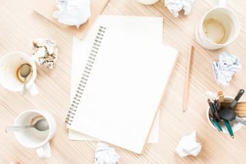 Blank notebook on disordered workspace