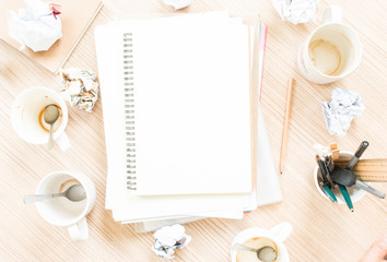 Blank notebook on disordered workspace