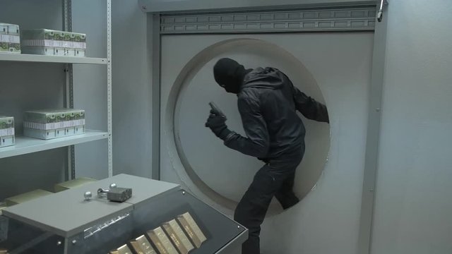 A man in a black mask