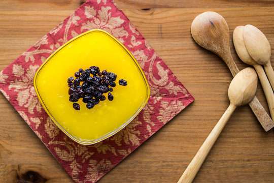 Turkish Traditional Dessert Zerde Pudding with Raisin.