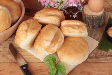 bread with custard delicious on wood background.