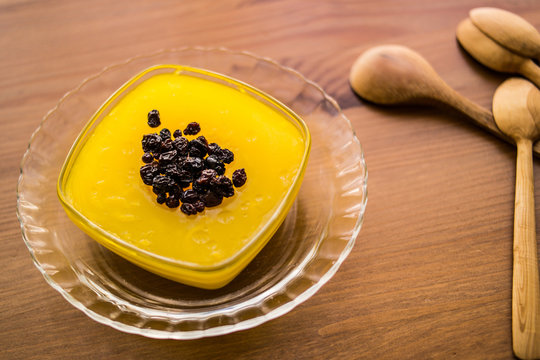 Turkish Traditional Dessert Zerde Pudding with Raisin.