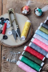 Fototapeta na wymiar Sewing Supplies ,scissors thread with and scissors.