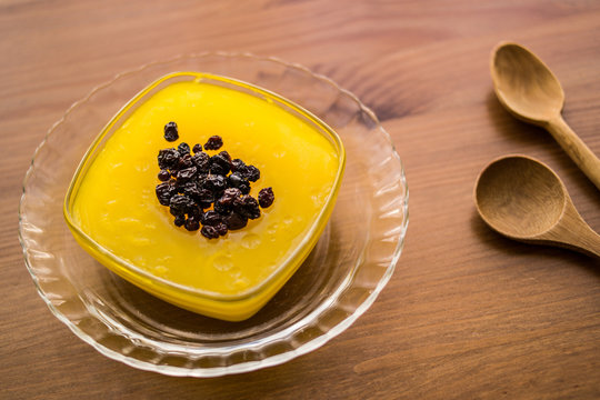 Turkish Traditional Dessert Zerde Pudding with Raisin.
