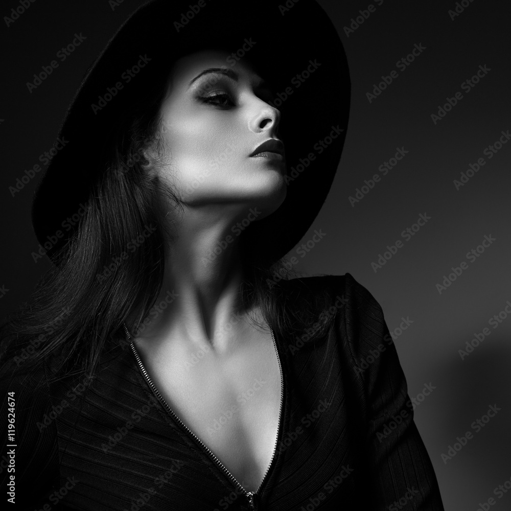 Wall mural Glamour sexy makeup woman profile posing in fashion hat on dark