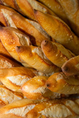 French baguettes freshly baked in a basket in bakery