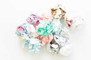Stack of colorful crumpled paper isolated