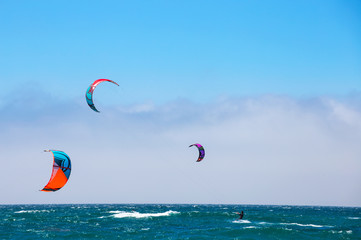 Group of runners at kitesurfing competition sport in Cascais, Portugal