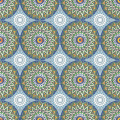 Seamless pattern with ethnic round ornament - mandalas in white, green, gold, blue and brown color scheme