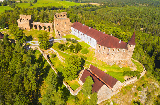Gothic castle Velhartice in National Park Sumava. Aerial view to medieval monument in Czech Republic. European landmarks from above.
