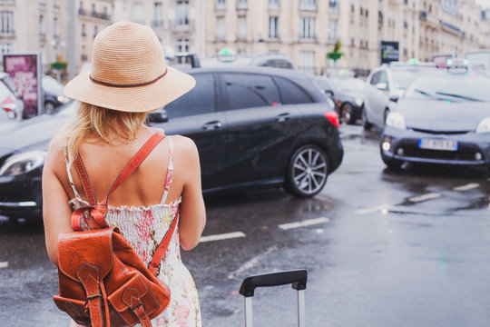 Woman Waiting For Taxi, Tourist Commuter With Suitcase And Backpack