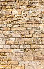 Eroded sandstone block wall