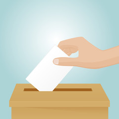 Put a vote paper in the ballot box