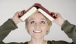 happy young blond woman with book