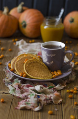 Pumpkin pancakes with sea buckthorn sauce for breakfast  